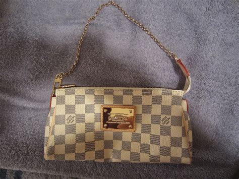 eva clutch louis vuitton replica|louis vuitton eva clutch damier.